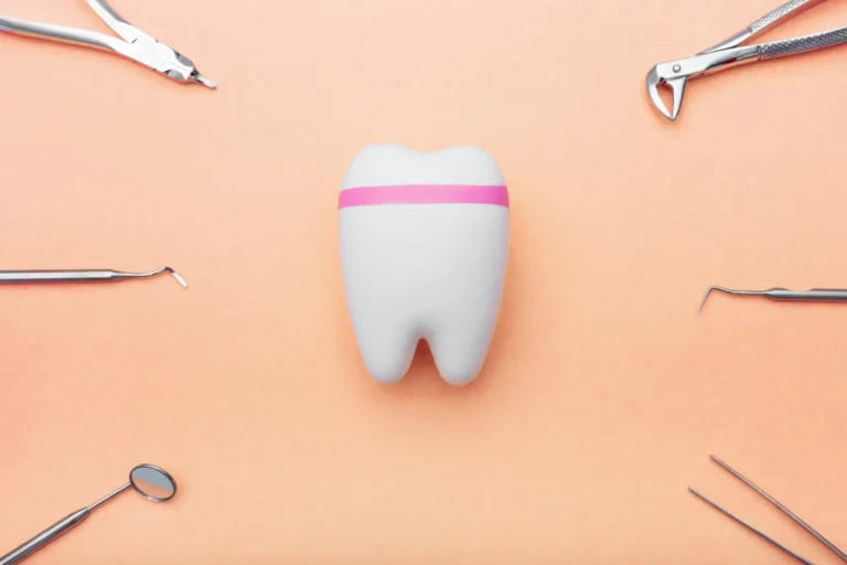 dentist tools around the tooth orange background 2023 11 27 05 20 45 utc 11zon